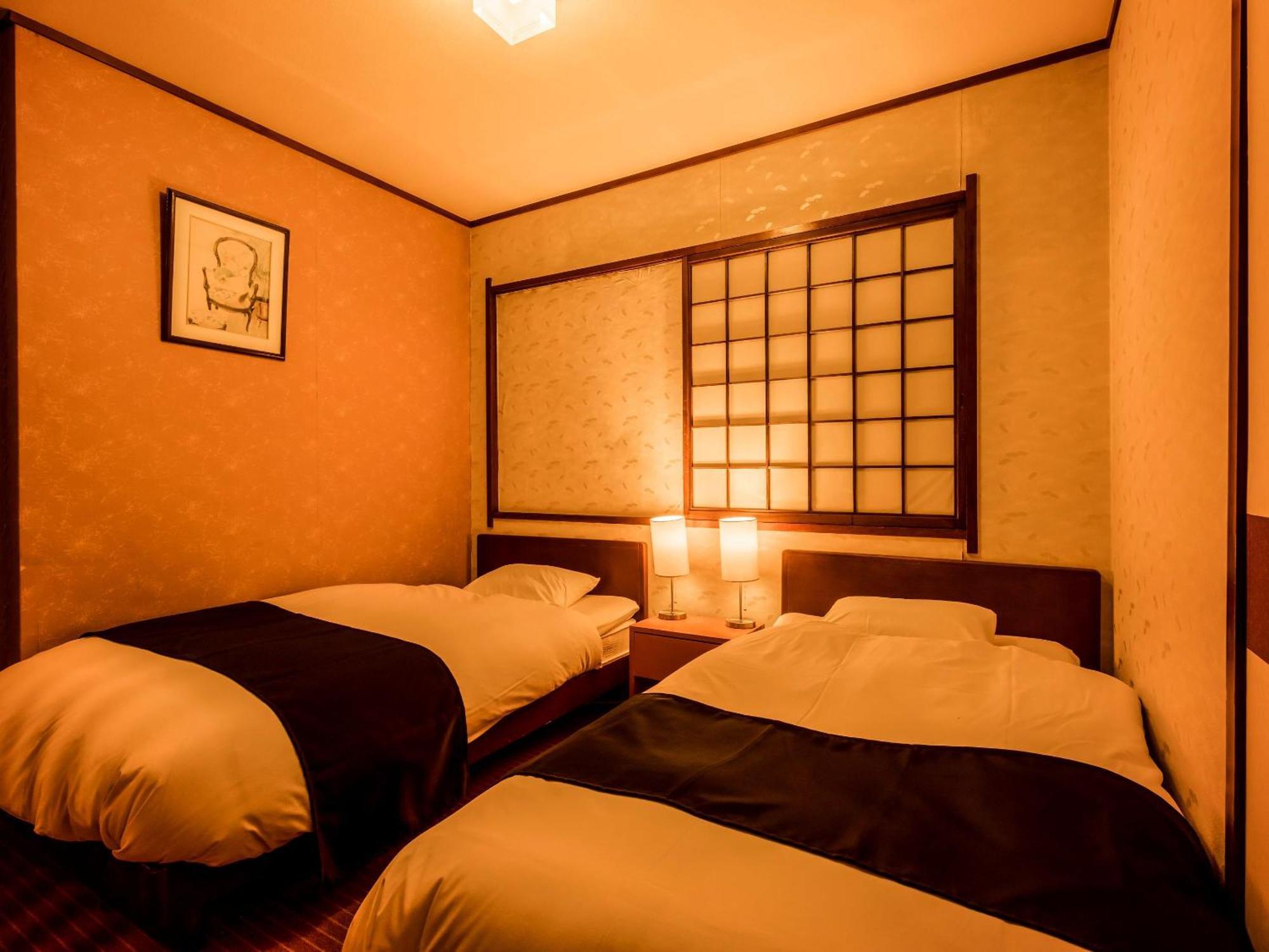 Отель Ooedo Onsen Monogatari Kaike Йонаго Номер фото