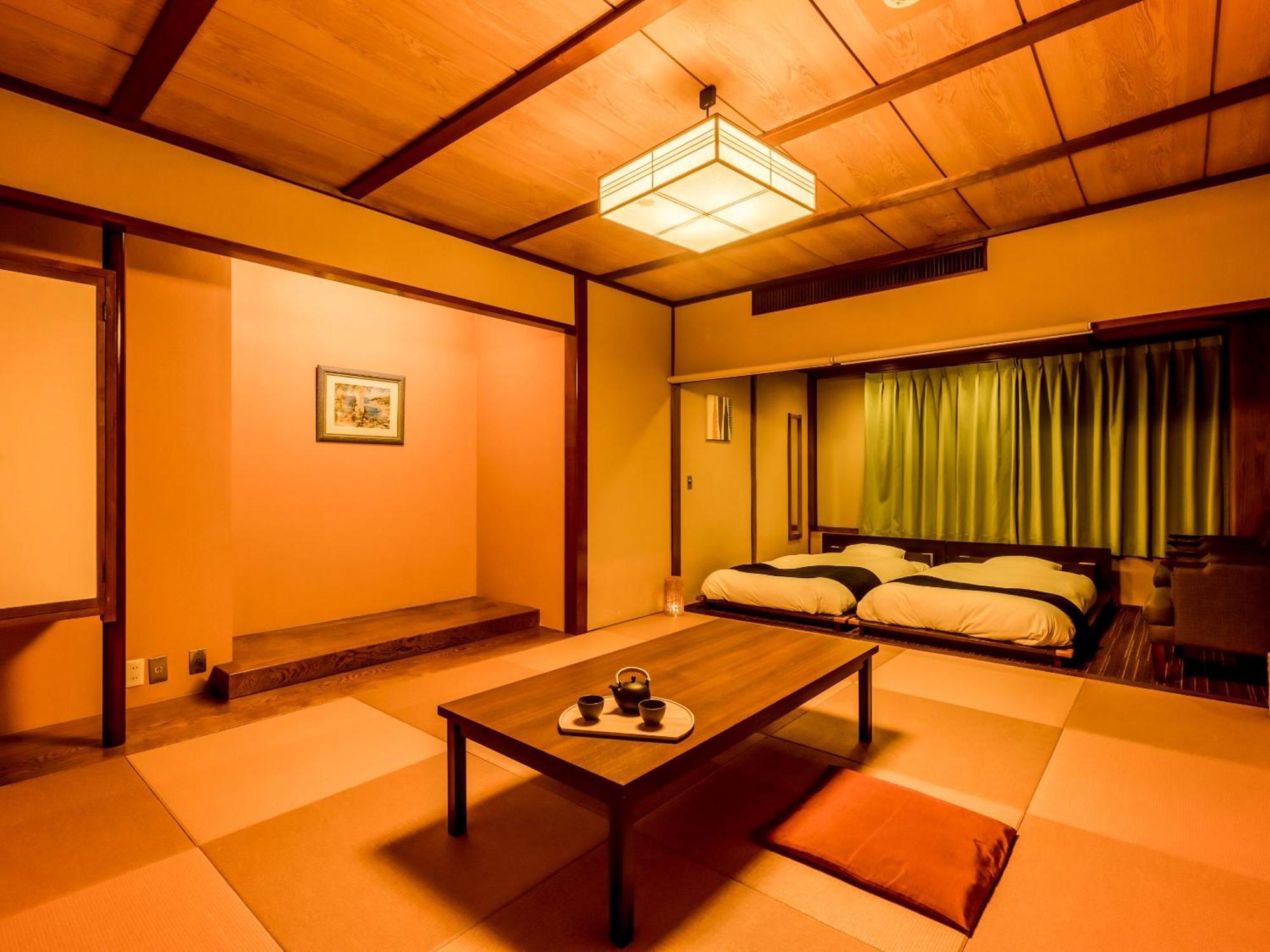 Отель Ooedo Onsen Monogatari Kaike Йонаго Номер фото