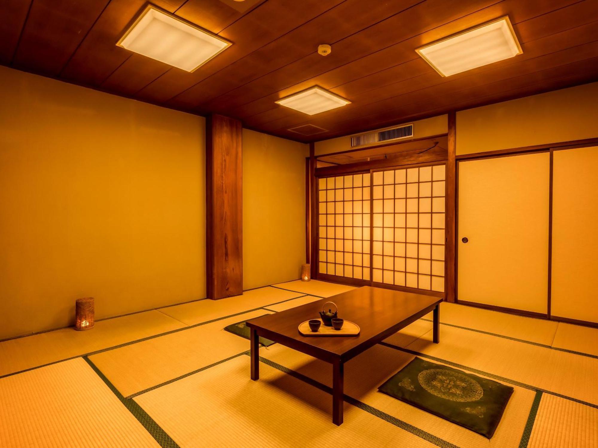 Отель Ooedo Onsen Monogatari Kaike Йонаго Номер фото