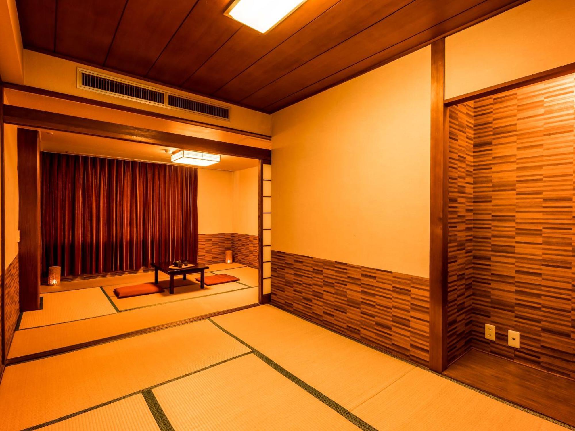 Отель Ooedo Onsen Monogatari Kaike Йонаго Номер фото
